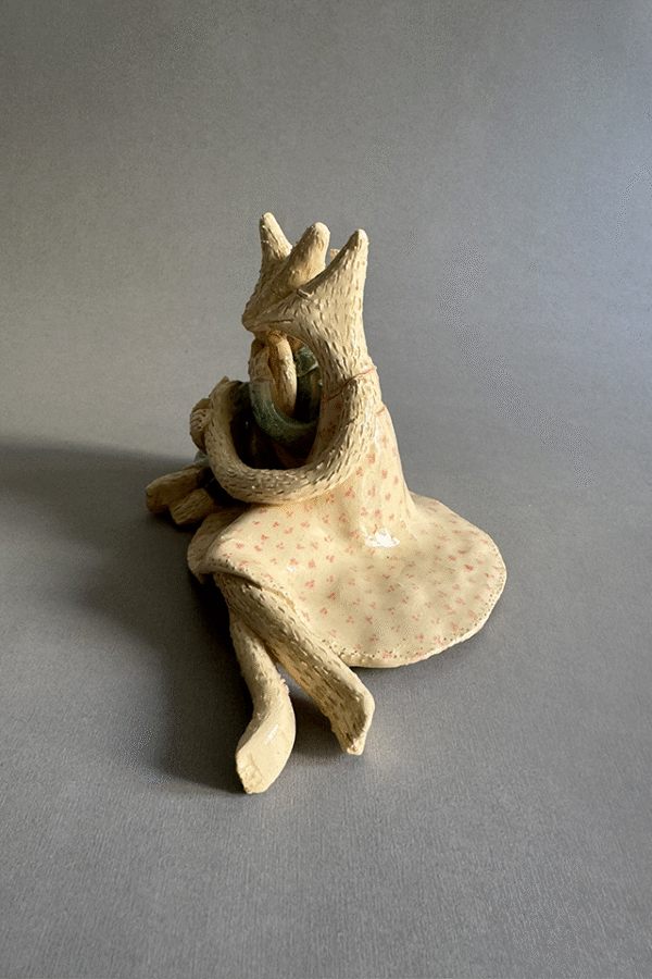 Pareja de ceramica acurrudados