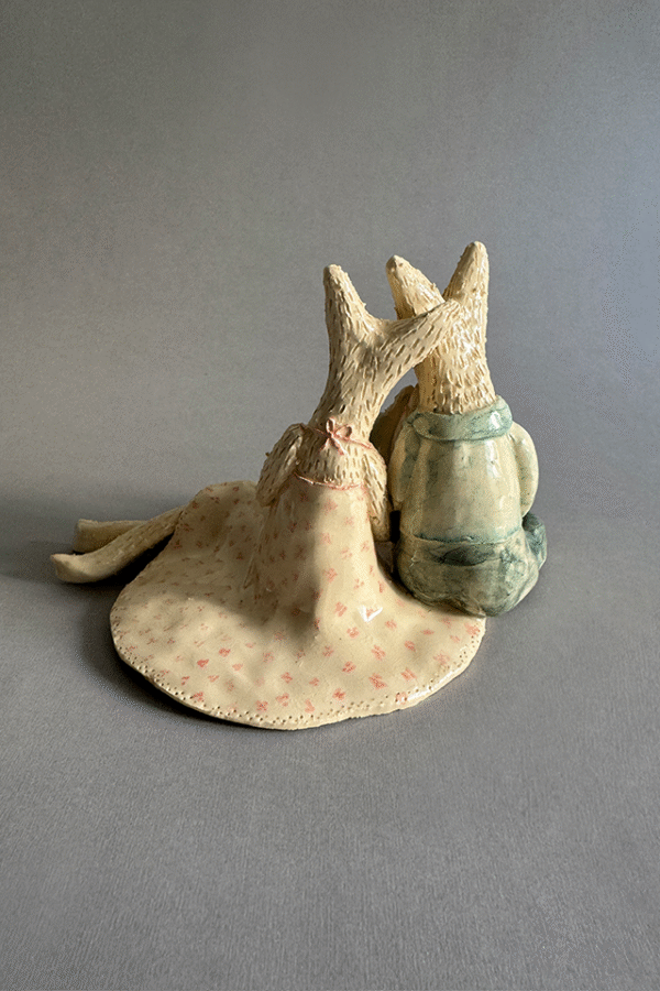 Pareja de ceramica acurrudados