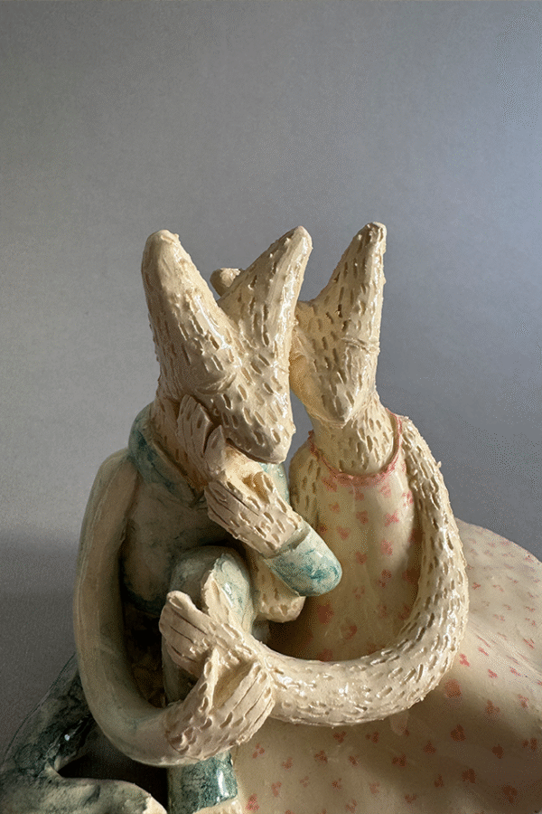 Pareja de ceramica acurrudados