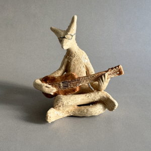 pieza de ceramica decorativa guitarrista